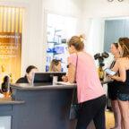 Picture of a crowded salon front desk, representing US tax changes