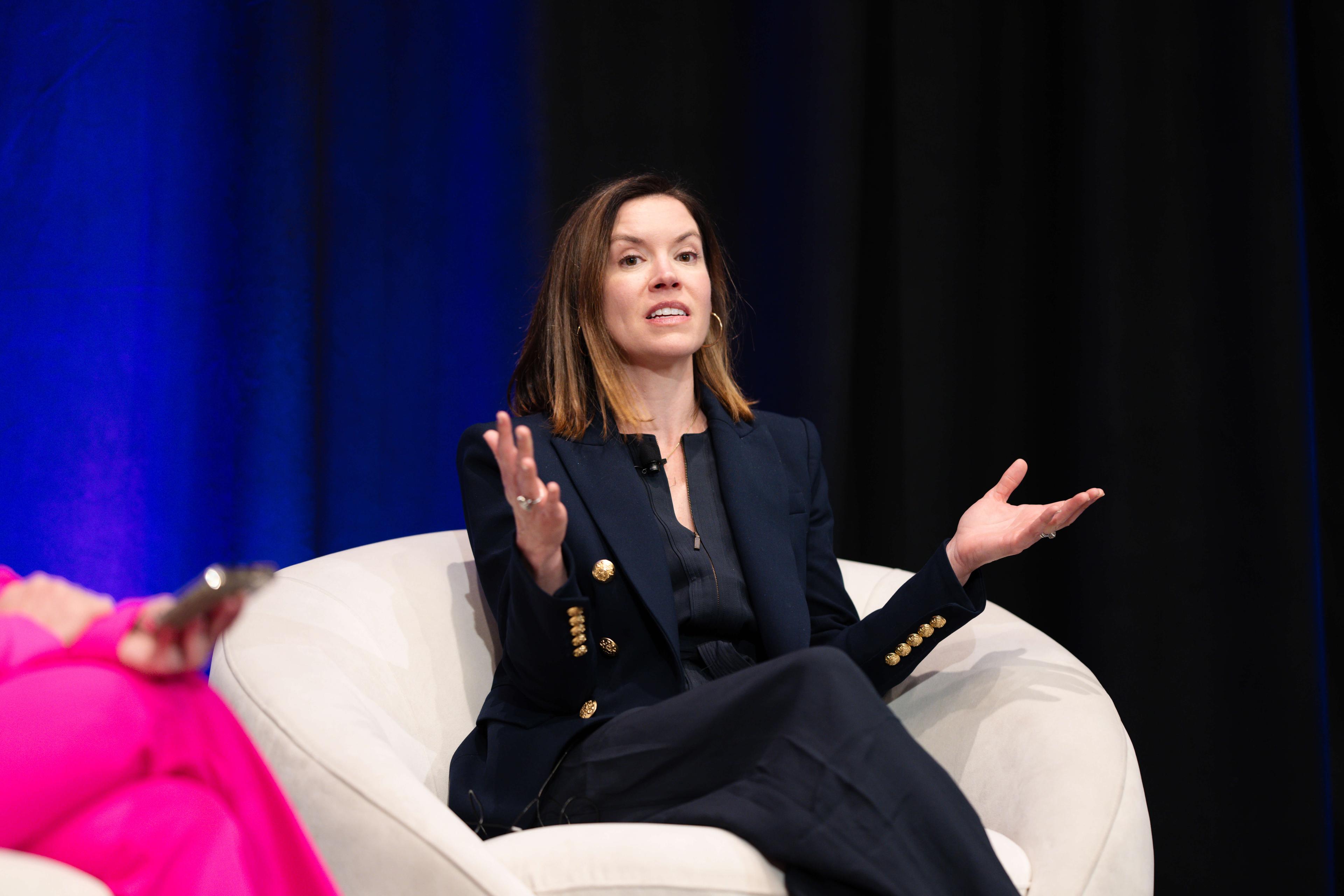 Dr. Sarah Allen, Founder, Skin Clique on stage at Innergize 2024