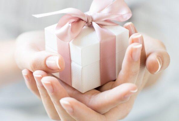 Small present representing beauty and wellness gift cards for expanded revenue