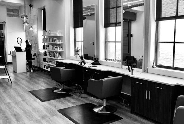 Black and white salon photo representing the keys to regular salon and spa revenue growth