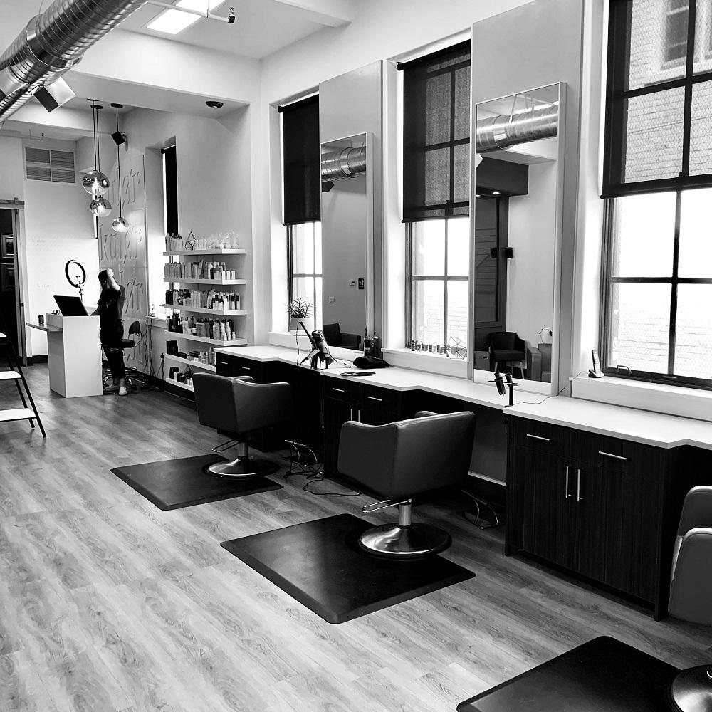 Black and white salon photo representing the keys to regular salon and spa revenue growth