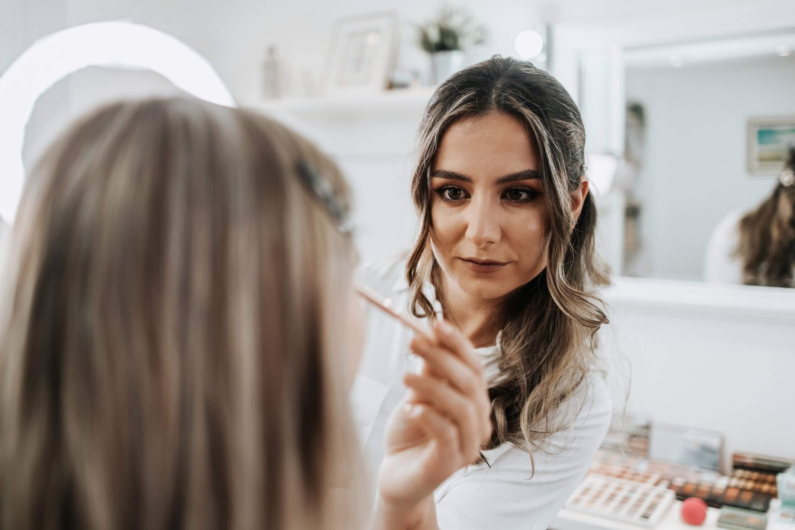 Salon owner representing a list of the best beauty salon business names